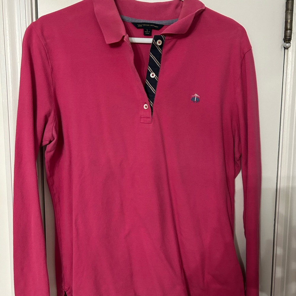 BrooksBrother women’s pink polo shirt
Shirt is classic fit.
